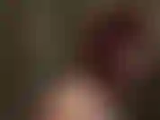 Red hot fierce latex mistress with riding crop.