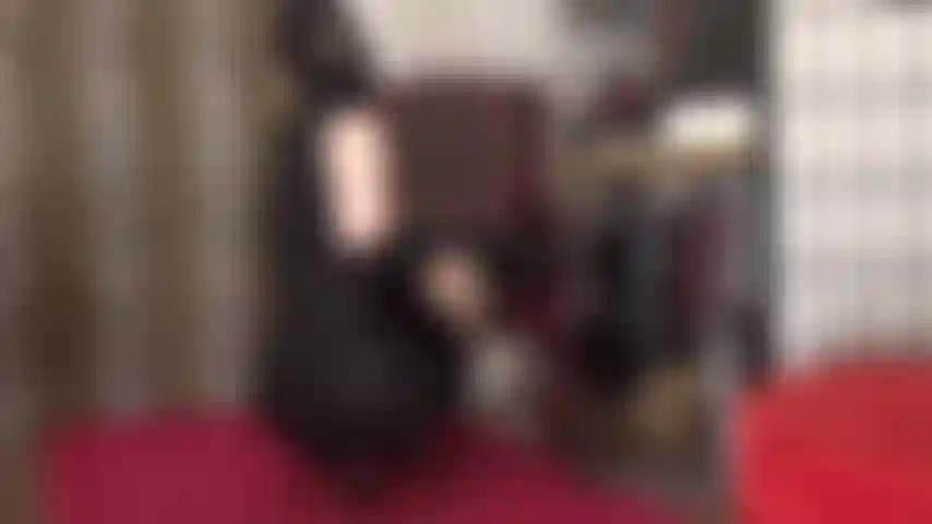 Glossy gray pantyhose, red sole pumps and lycra outfit with hood.