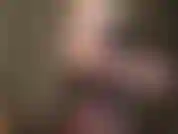 Sexy little lace lingerie teddy bodysuit and seamed black pantyhose.