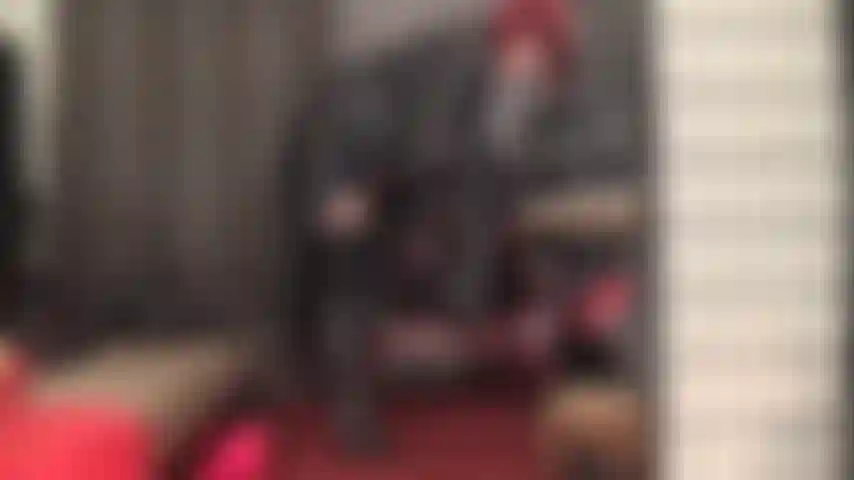 Leather mistress drives you wild in tall boots, long coat, short skirt and tempting upskirt views.