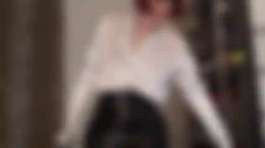 Silky white satin and shiny black pvc - you adore mistress' shiny clothes, here a white satin blouse with matching gloves, white shiny pantyhose, tall black boots and pvc mini skirt. Your fetish dreams come true.