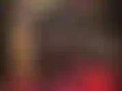 Opaque black nylon bodystocking and leather - like a sexy villain, mistress vivian is dressed in black catsuit and leather gloves, corset and boots demanding worship.