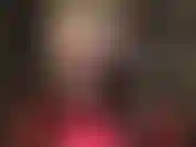 Incredible long legs in fancy seamed sheer black pantyhose and tall red ankle platform boots. Underneath the hose, a pretty pair of lace panties that will drive you insane.