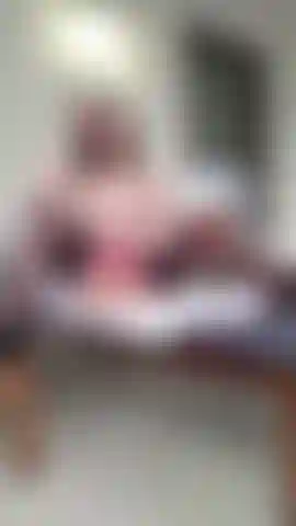 Smoking on the terrace in sexy lingerie