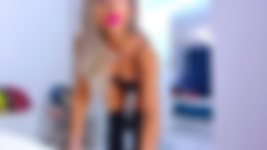 Black latex boots tease.