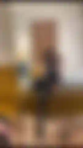 Latex tease with a glimpse of nipples