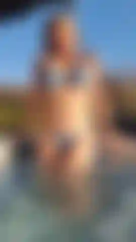 Raunchy hot tub strip tease.