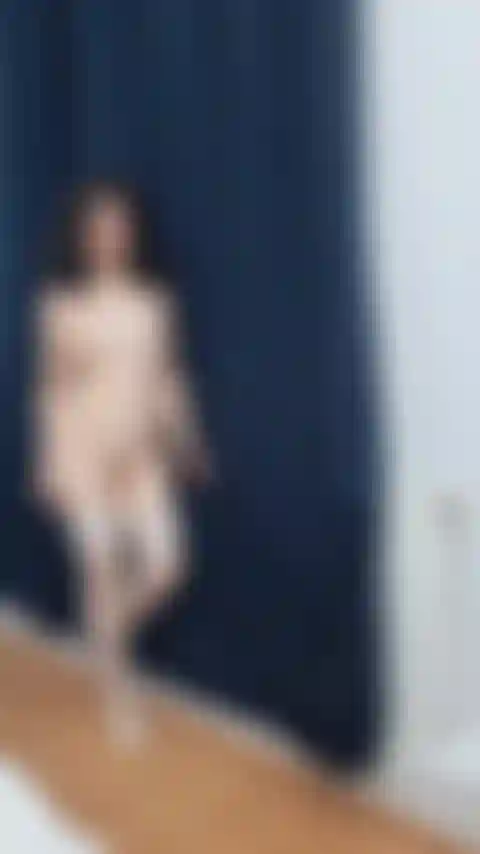 Walking naked, only in white stockings and white heels, I present you my sexy body.