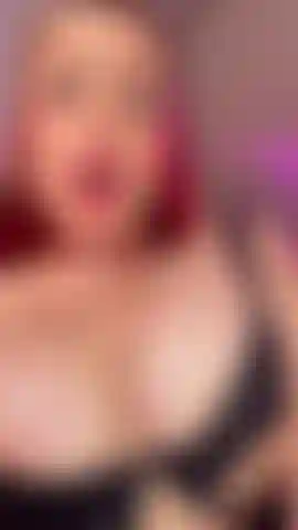 tits full of oil with a cock in between