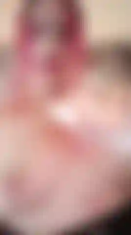 Oiled and glistening, my submissive body is ready for your touch.