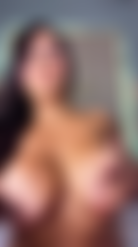 Massaging my big tits.