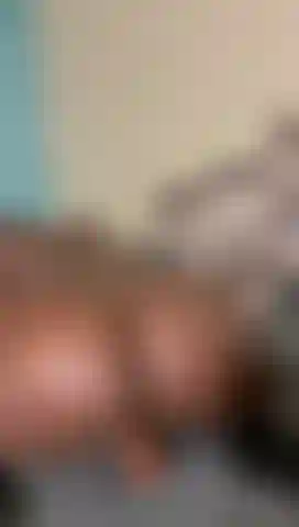 Riding a brown dildo while moarning softly