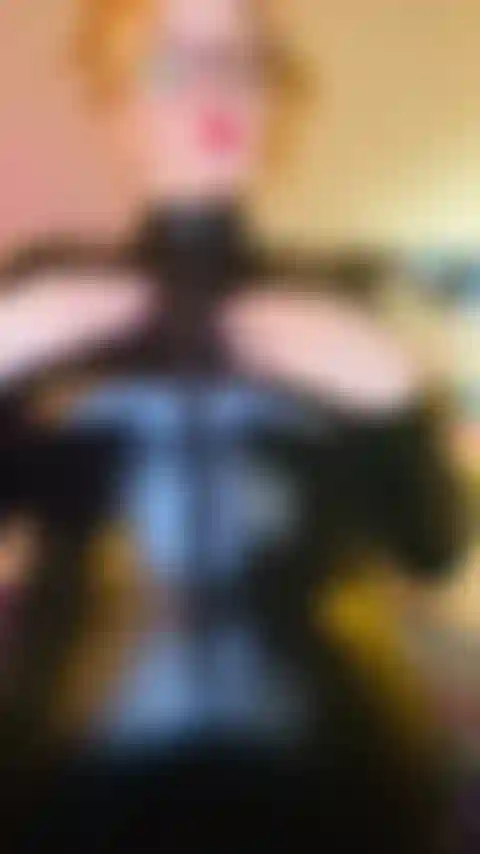 Shiny Leather Catsuit Tease