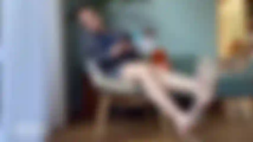 Relaxed and Distracted Business Woman High Heel Dangling
