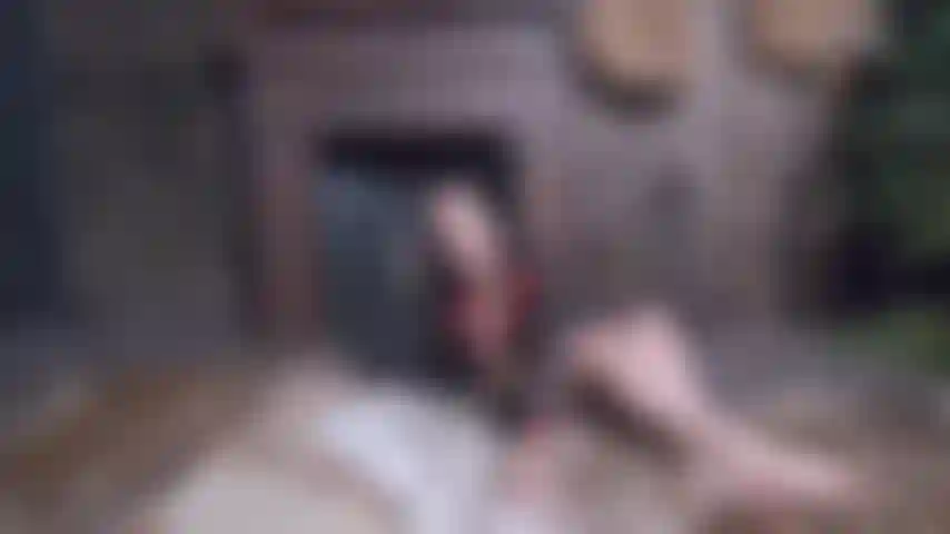 Wanking in front of the fireplace.