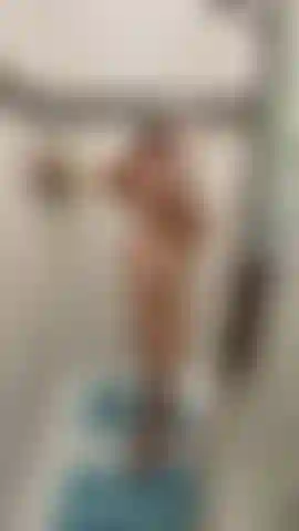 Naked & wet in the shower with front & back view.