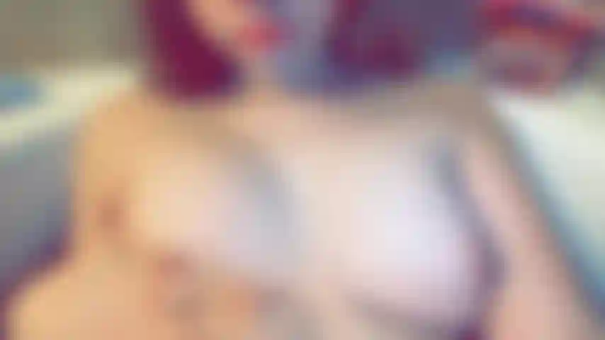 naked in bathtub playing with tits while sucking on fingers (