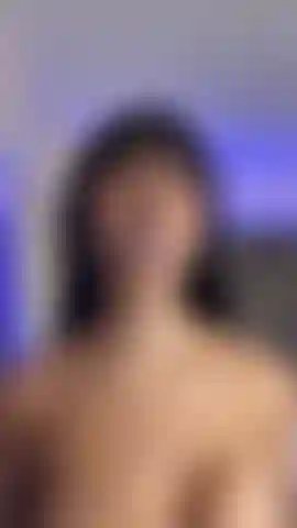 Gag in my mouth and bare tits.