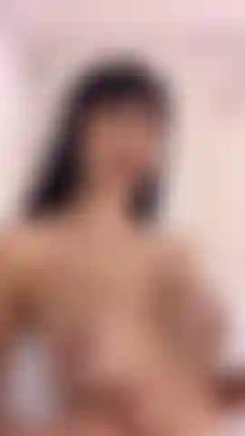 Milk in my naked tits.