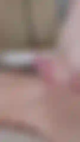 laying in bed playing