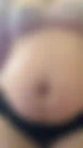 Rubbing oil onto my pregnant belly