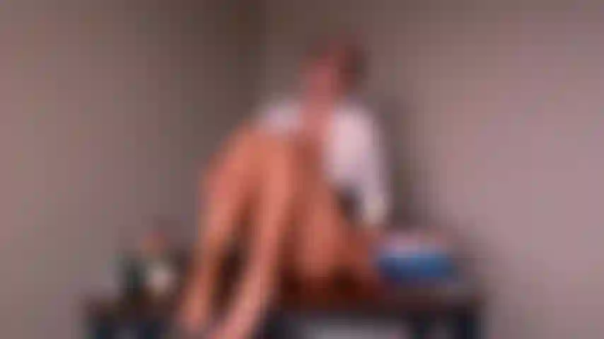 Horny professor fingers pussy on desk while thinking of her students hard young cock!