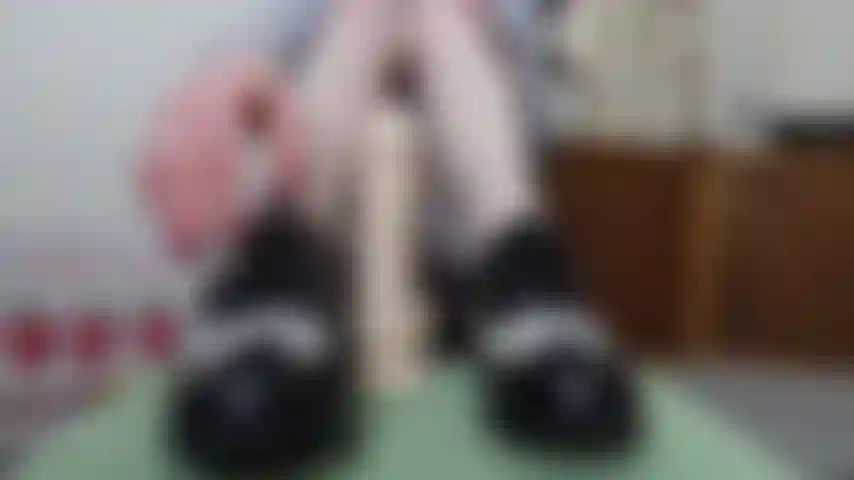 Miniskirt preppy foot job, removing lace up flat shoes, red toe nails visible through my cream stockings I give dildo a foot job.