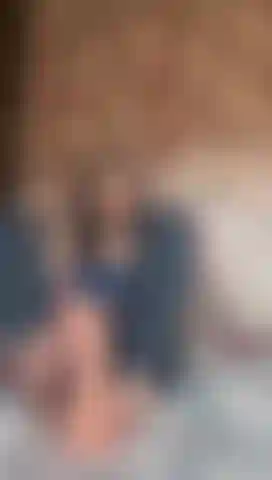 Giving you a footjob with oil and showing my perky tits