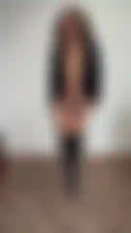 Black coat, thong & boots, modeling for you