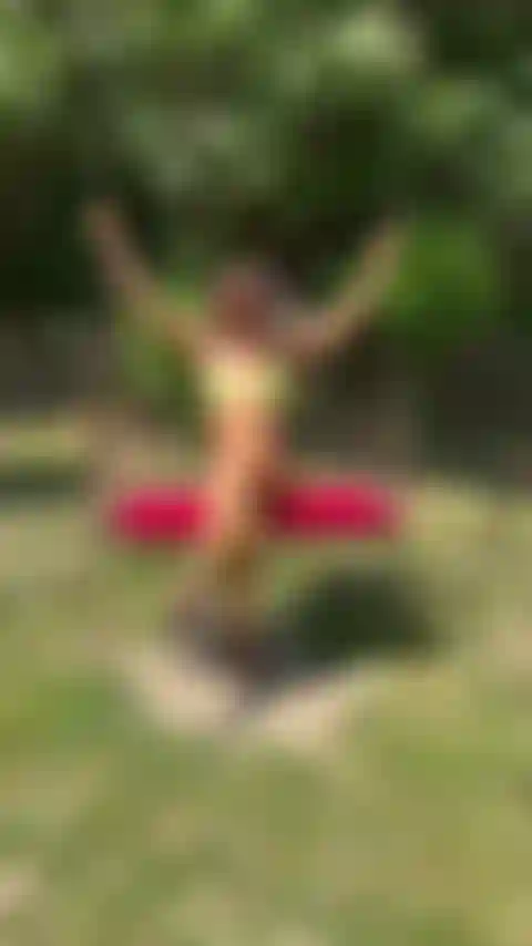 On my swing, enjoying sunshine in my bikini