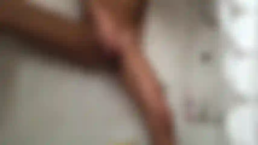 Pussy playing with dildo in the shower, front view, leg up