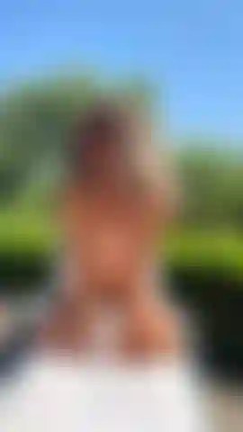 Topless sunbathing, facing you on my knees