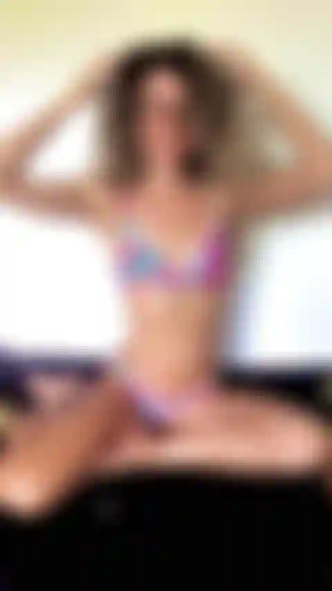 Bikini posing on my bed showing off my abs