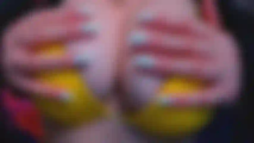 squeezing and licking tits