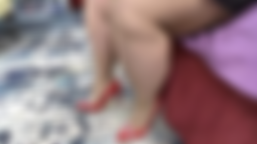 RED_PUMPS_&_TAN_THIGH_HIGHS_TAPING_FOOT_LIKE_ITS_ON_A_GAS_PEDAL