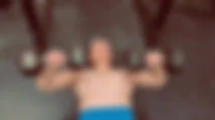 Morning Lift - Starting the day strongtopless dumbbell presses with natural light streaming in. Real workout, real body, no filter.--topless, breasts, fitness, workout, natural, athletic--