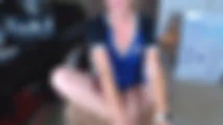 118. Doll riding with white leather KEDS on