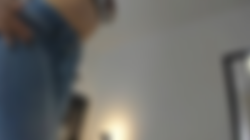 Taking off my jeans.