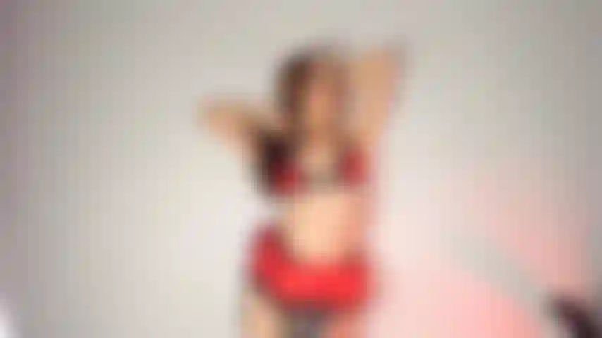 Teaing you in red lingerie.