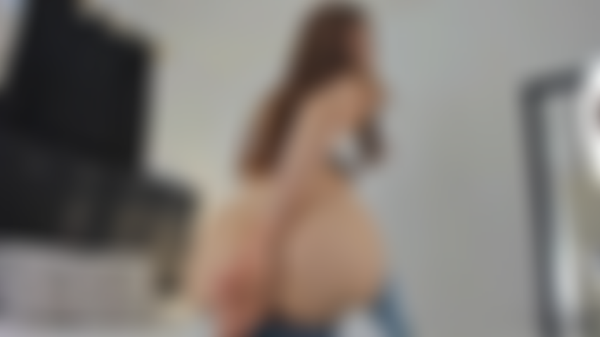 Slapping ass with dildo.