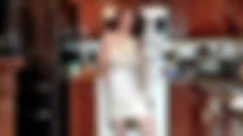 I spread whipcream on my body. In the kitchen i brush myself with whipping cream.