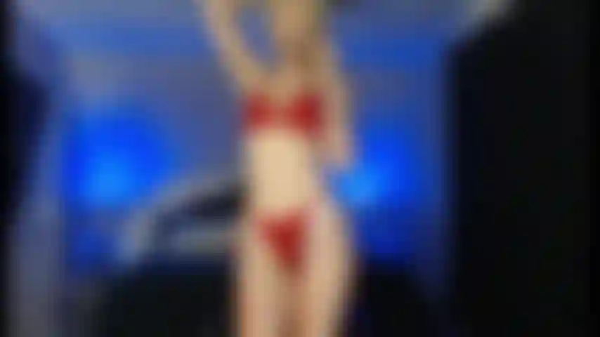 Gold show, red lingerie, sheer black stockings, riding