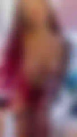 Rubbing the dildo against my pink pussy.