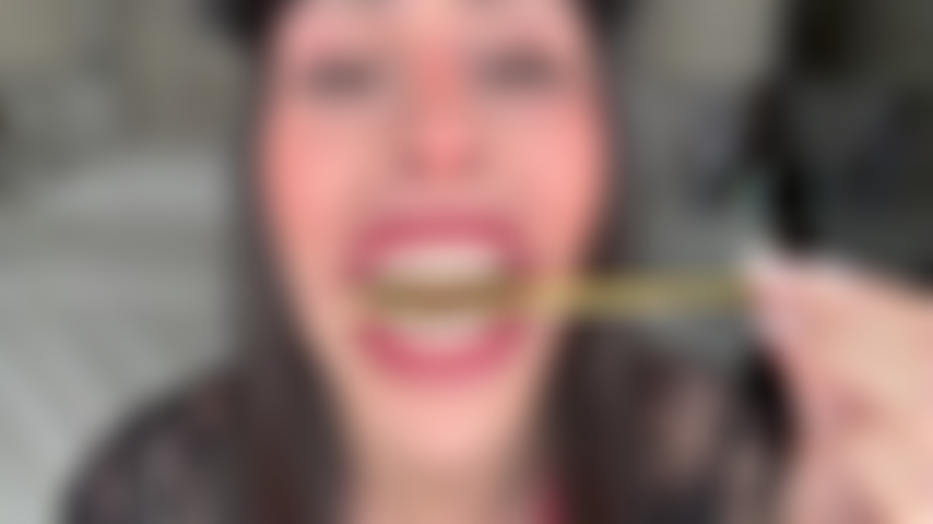 Giantess bites and licks pencil!