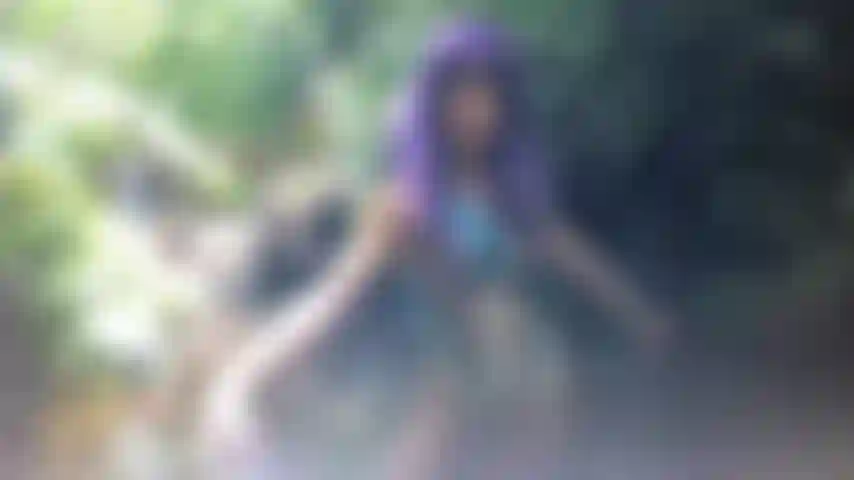 Dancing in purple wig & nude leotard