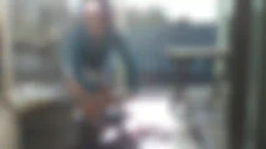 Art video in silver mini skirt, lace shirt, short hair, Miami.