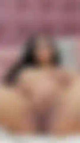 Lying on the bed fully nude, fingering myself and squeezing my tit at the same time.