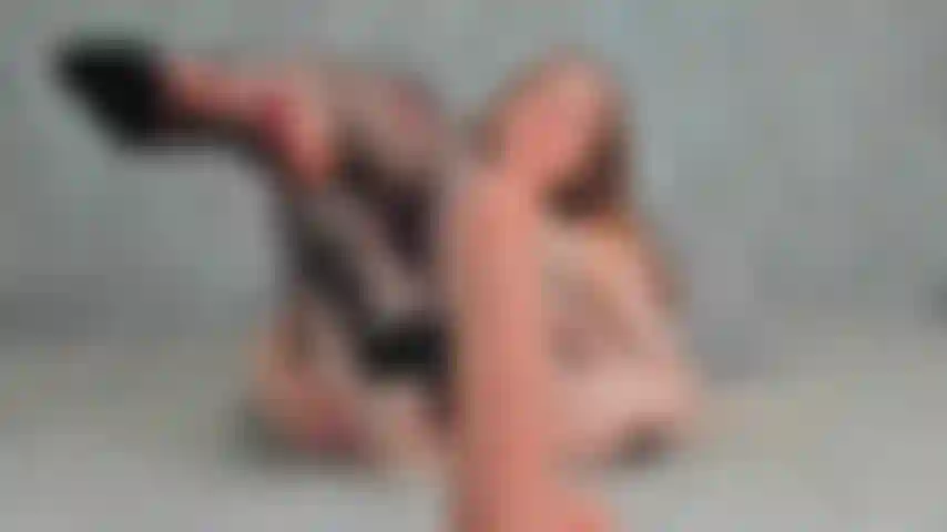 Footjob in black nylon  pantyhose