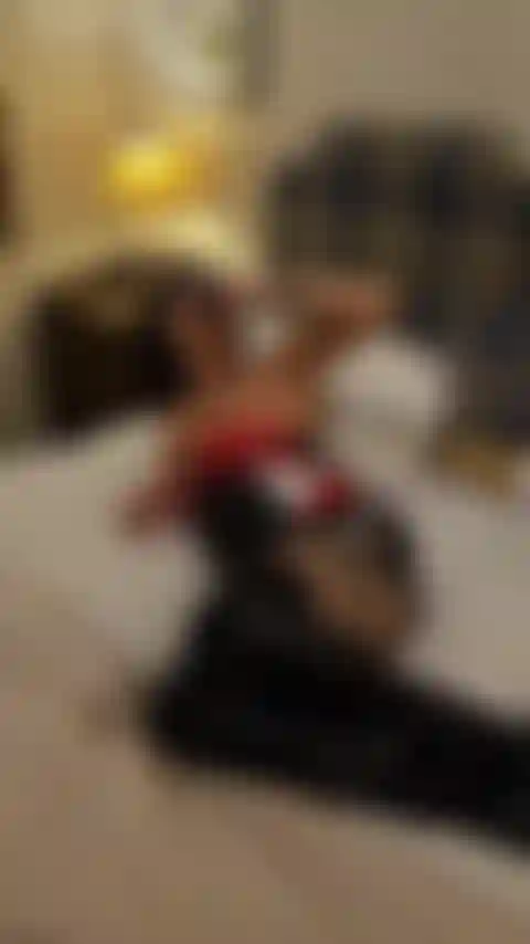 PVC Booted slut on hotel bed Fat dildo suck fuck cum