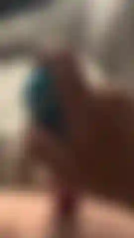 Playing with my shaved pussy on the sofa. I really hope I don’t get caught